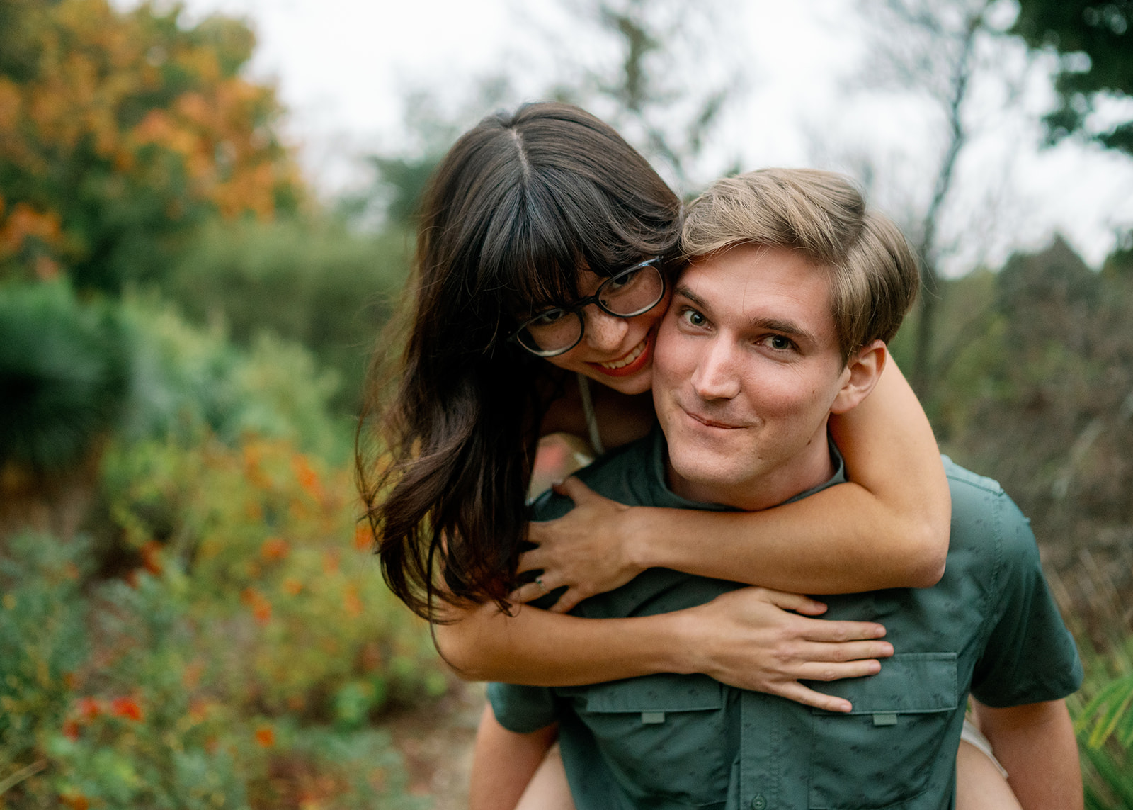 Ngara draped over Lucian's back